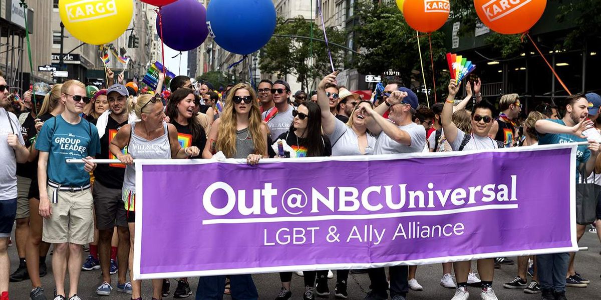 Breaking: NBC lays off teams of journalists focused on marginalized communities, ending NBC Out & NBC BLK 3 nbc out lgbtqia pride parade marching contingent nyc 2017 ZVvJUg