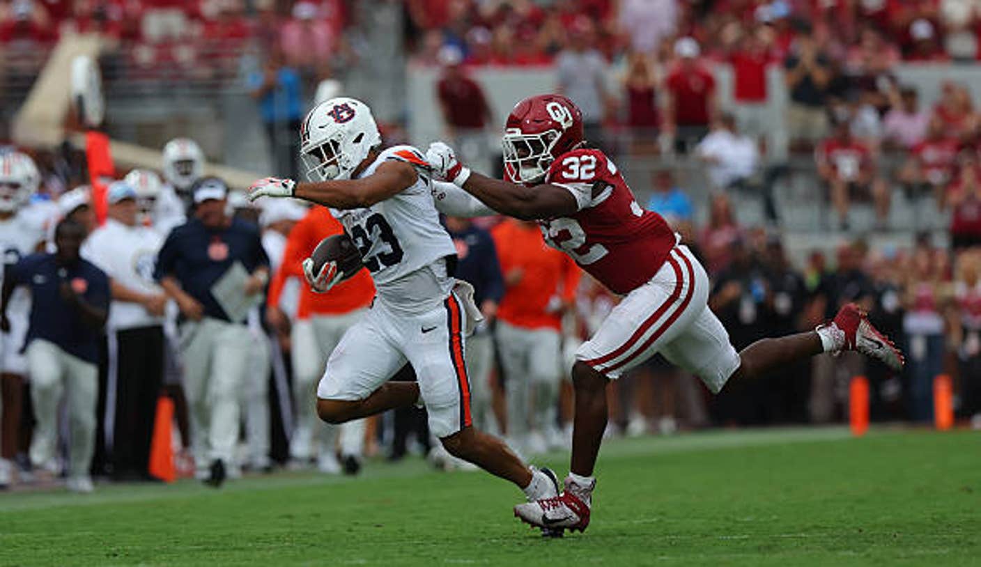 norman ok auburn running back jeremiah cobb is caught from behind by oklahoma defensive tsuXJd