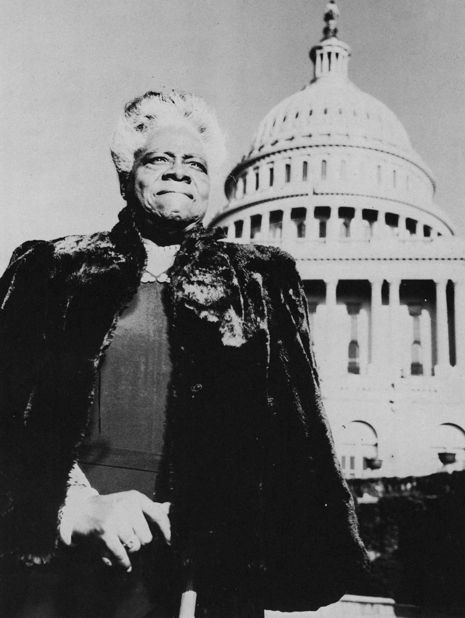 Portrait of American educator and activist Mary McLeod Bethune (1875 - 1955) with the United States Capital Building in the background, circa 1950. (Photo by Hulton Archive/Getty Images) *** Local Caption *** Mary McLeod Bethune